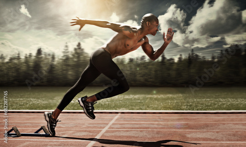 Man, runner and starting line for sprint, cardio and ready for marathon, track and race or competition. Black male person, training and exercising or speed, practice and athlete or fitness for body photo