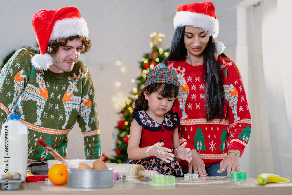 Kid mom daddy family celebrating xmas Christmas thanksgiving in dining room enjoy kneading cake dough together. People enjoy celebrate Christmastime festive with yummy good taste food drink joy party