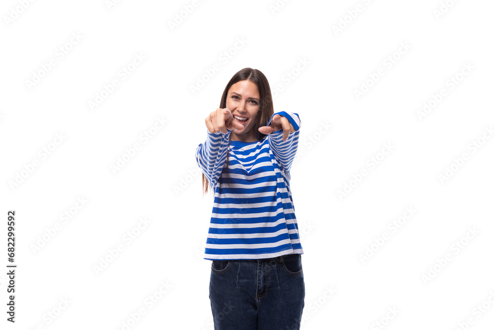 young cute slender brunette lady with straight hair is dressed in a blue striped sailor jacket young cute slender brunette lady with straight hair is dressed in a blue striped sailor jacket