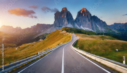 mountain road beautiful asphalt road in the evening incredible summer day vintage toning highway in mountains pass giau dolomites alps italy popular travel and hiking destination photo