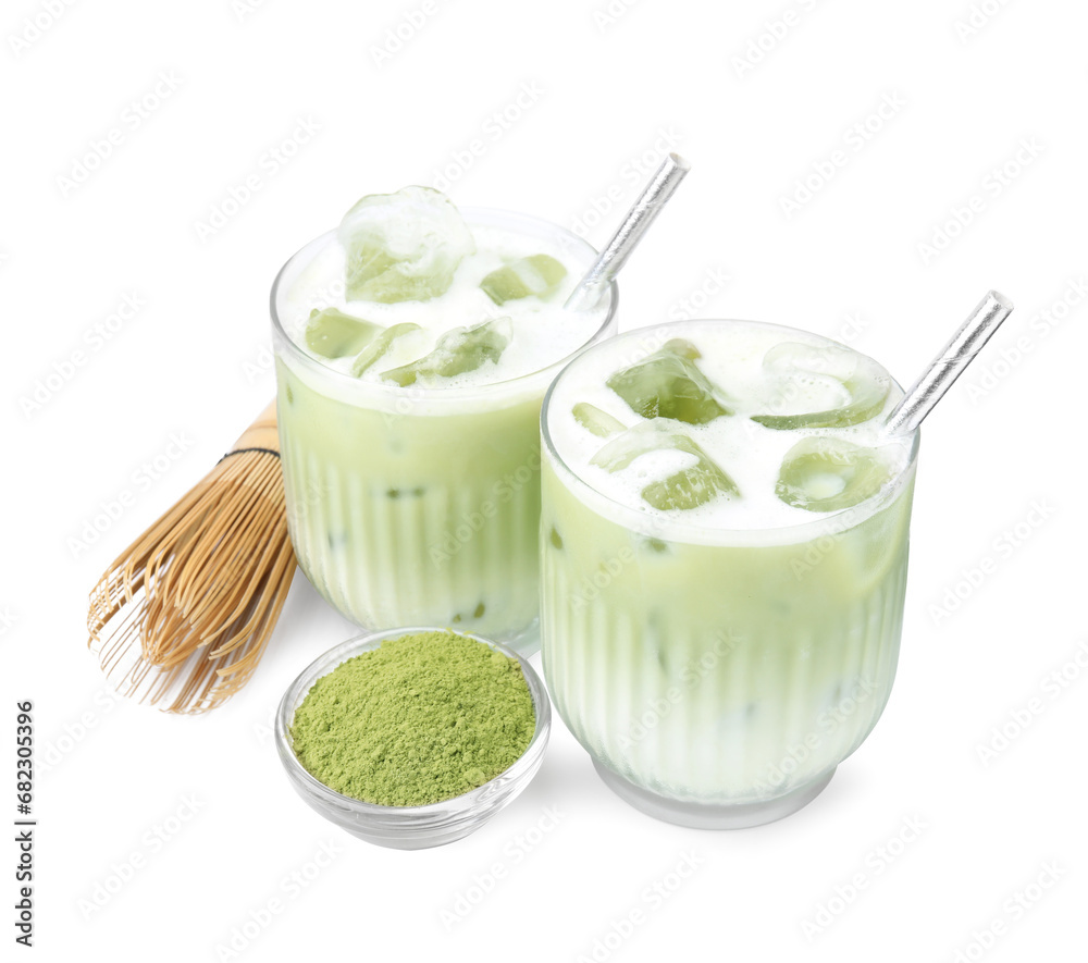 Glasses of tasty iced matcha latte, bamboo whisk and powder isolated on white Glasses of tasty iced matcha latte, bamboo whisk and powder isolated on white