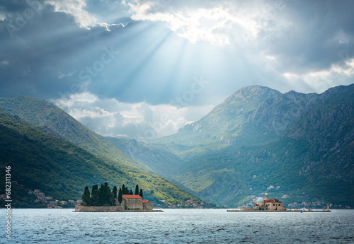 Our Lady of the Rock and St.George Island near town Perast, Montenegro. Beautiful evening view at sunset. Adriatic Sea. Perast, Kotor bay, Montenegro. photo