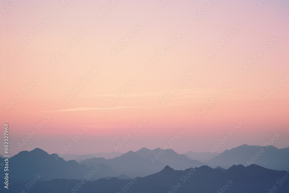 A minimalist depiction of mountain silhouettes against a soft gradient sky, radiating simplicity and tranquility.