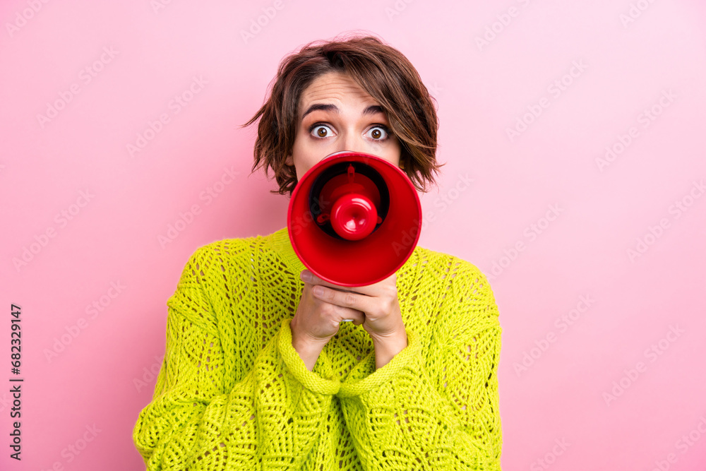 Obraz premium Photo of young excited caucasian funny crazy woman activist hold megaphone scream loudspeaker isolated over pink color background