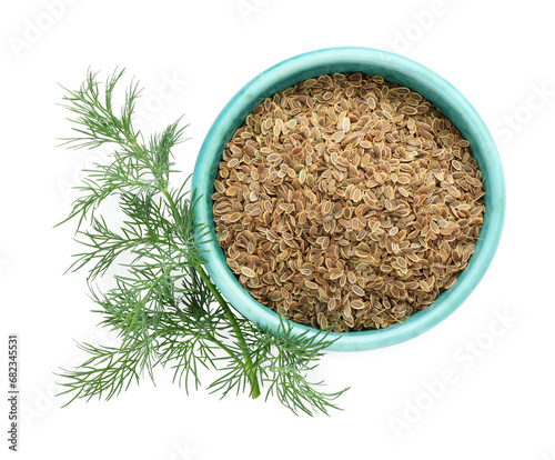 Bowl of dry seeds and fresh dill isolated on white, top view