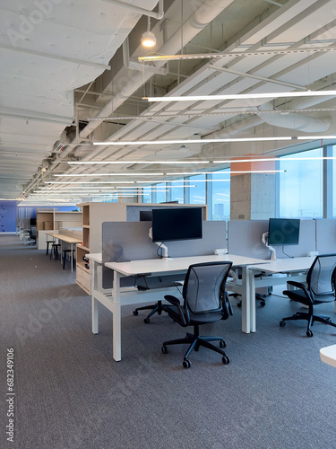 Interior of modern empty office building.Open white ceiling design.