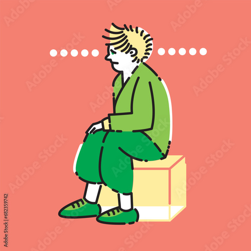 A person sits on a box staring blankly