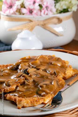 Fototapeta Naklejka Na Ścianę i Meble -  Sauerkraut pancakes /fuczka/ with mushroom sauce .