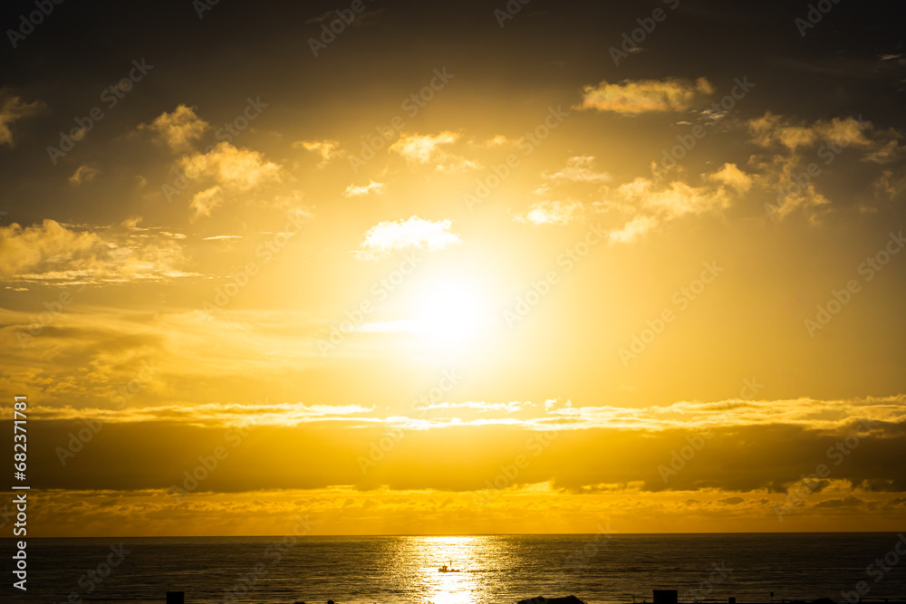 Obraz premium Sunrise over the Atlantic Ocean. Shot from the Dunes of Maspalomas Gran Canaria
