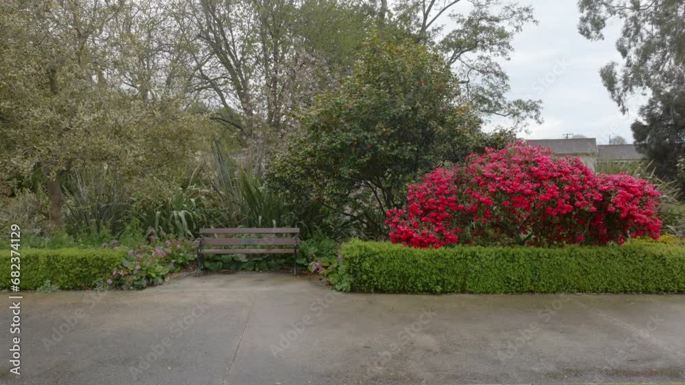 Aerial: flower beds and fountain in the Oamaru Public Gardens in the South Island, New Zealand