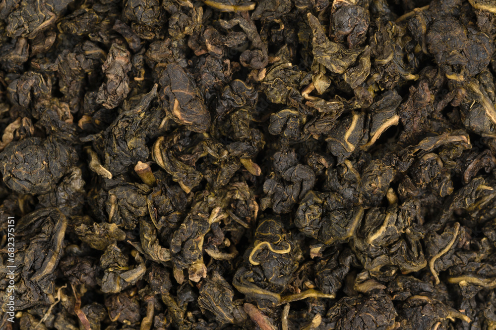 Pile leaf tea with various additives background, top view. Heap of dried tea texture Pile leaf tea with various additives background, top view. Heap of dried tea texture