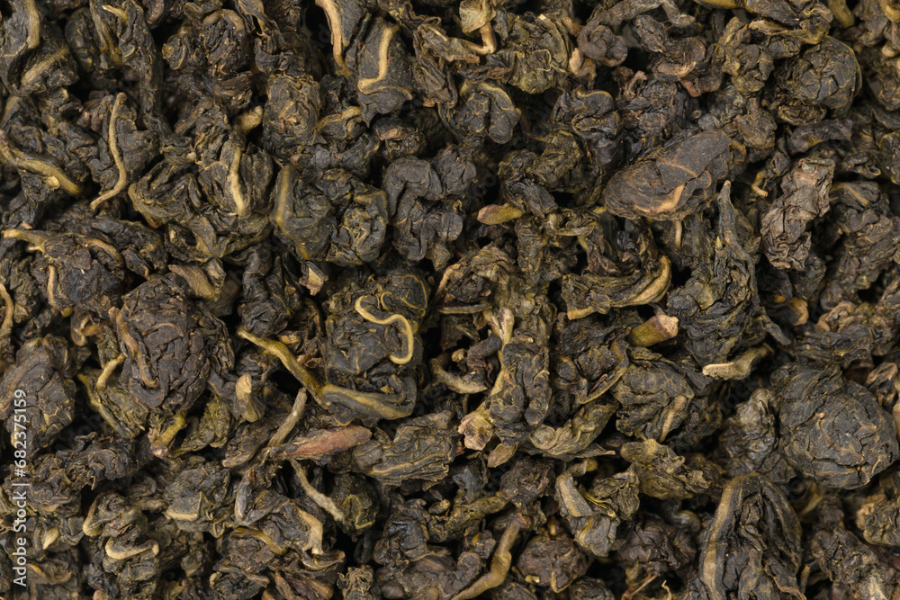 Pile leaf tea with various additives background, top view. Heap of dried tea texture Pile leaf tea with various additives background, top view. Heap of dried tea texture