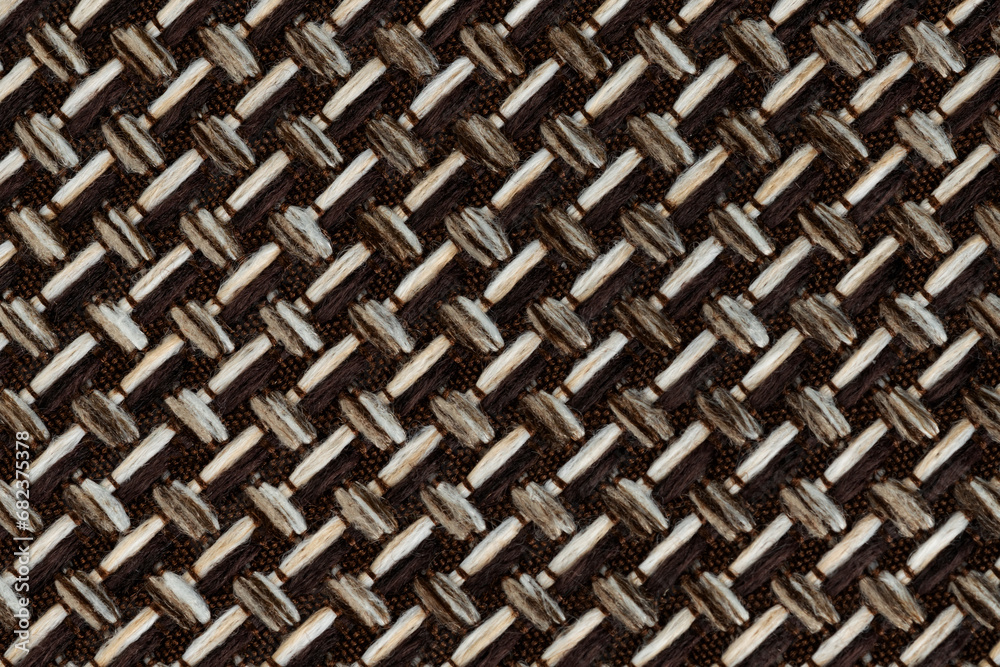 Texture of brown wicker furniture fabric. background matting cotton flap upholstery. CORFU fabric Texture of brown wicker furniture fabric. background matting cotton flap upholstery. CORFU fabric