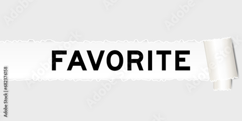 Ripped gray paper background that have word favorite under torn part