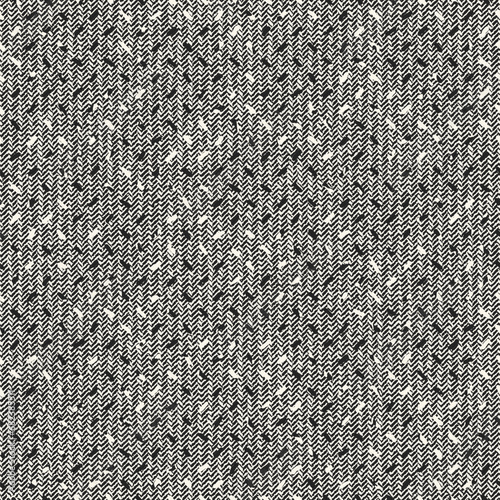 Monochrome Irregularly Textured Herringbone Pattern