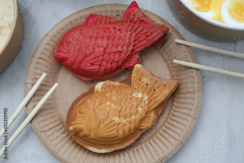 Bungeoppang, bungeo-ppang (Korean Fish Shaped Pastry), popular snack, cookies, sweet in winter streets of Korea. Bungeoppang (붕어빵) - Korean traditional national food, dish, cuisine. Japanese taiyaki