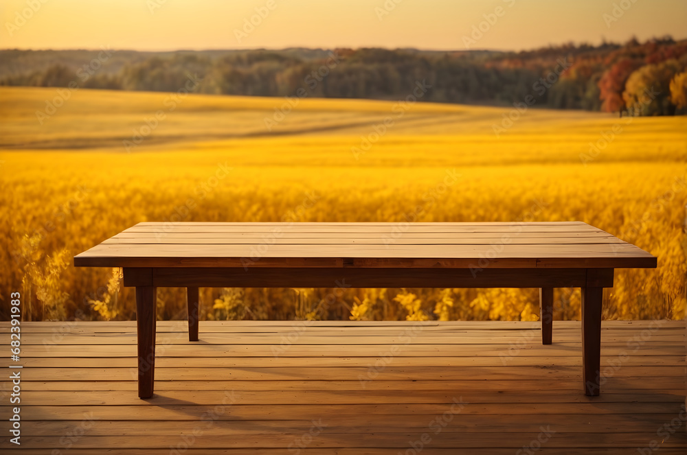 empty wooden table with beautiful autumn golden yellow meadow background