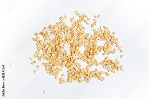 Dried oatmeal grains isolated on a white background. Top view.
