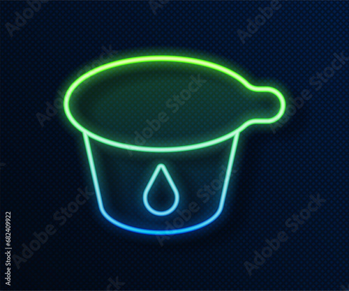 Glowing neon line Yogurt container icon isolated on blue background. Yogurt in plastic cup. Vector