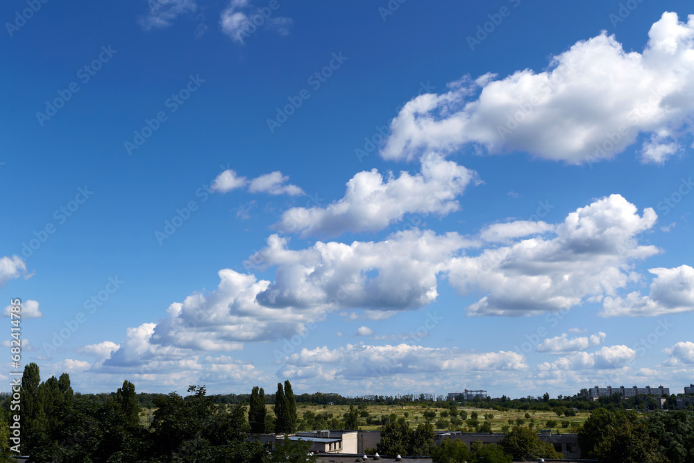 Clouds in the sky above the ground, meteorological science, skyward view Clouds in the sky above the ground, meteorological science, skyward view