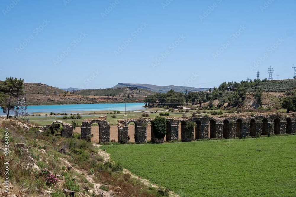 Destroyed old aqueduct in Manavgat, Turkey. Oymapinar Lake, Turkey. Green Canyon in Manavgat region, Turkey. Emerald water reservoir behind the dam Oymapinar. 