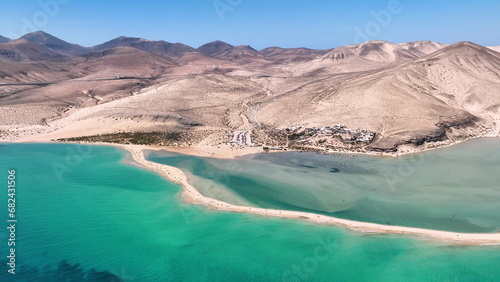 Aerial view of golden sand and crystal sea water on the Canary