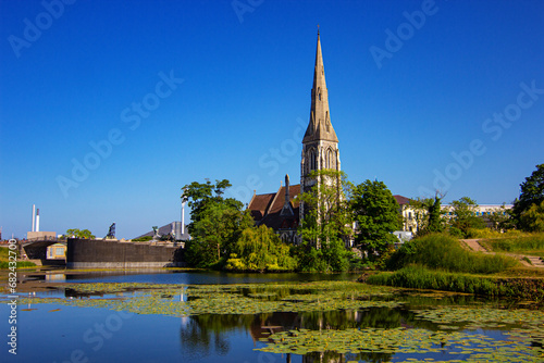 St. Alban's Church, traditional English parish church in the Gothic Revival style. It is situated near Kastellet fortress defence moat filled with water in the city of Copenhagen, Denmark