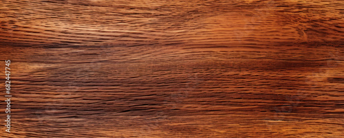 Seamless Tan Wood Texture. A close-up view of a seamless wooden texture with a rough tan surface and natural patterns