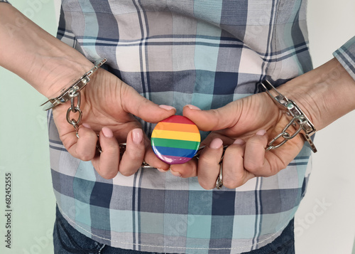 Obraz na plátně Closeup of young woman hands in handcuffs