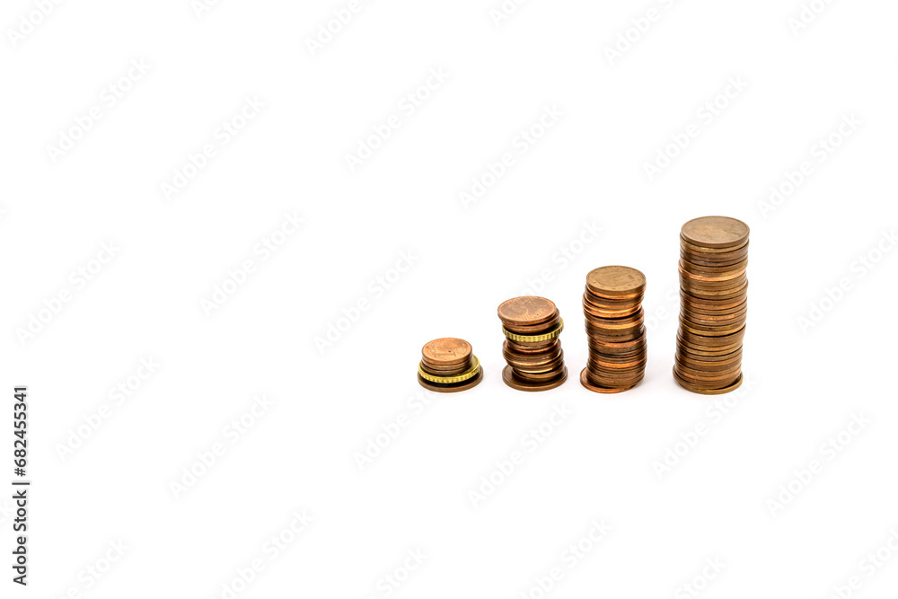 four stacks of coins forming steps up, isolated on white background,finance concept four stacks of coins forming steps up, isolated on white background,finance concept