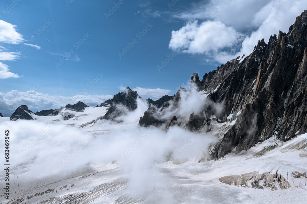 Panoramic view over mountain ridges leading to the Mont Blanc