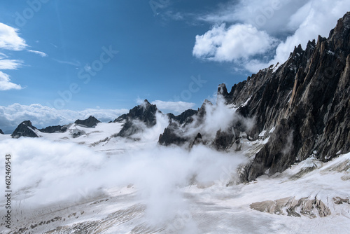 Panoramic view over mountain ridges leading to the Mont Blanc