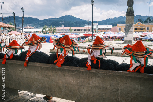 Tzotziles male in traditional clothing waiting for the ceremony of the chiapas famous village San Juan de Chamula , Mexico , October 2023  photo