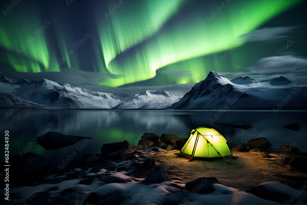A camping tent pitched by the riverbank, offering a picturesque view of the Northern Lights