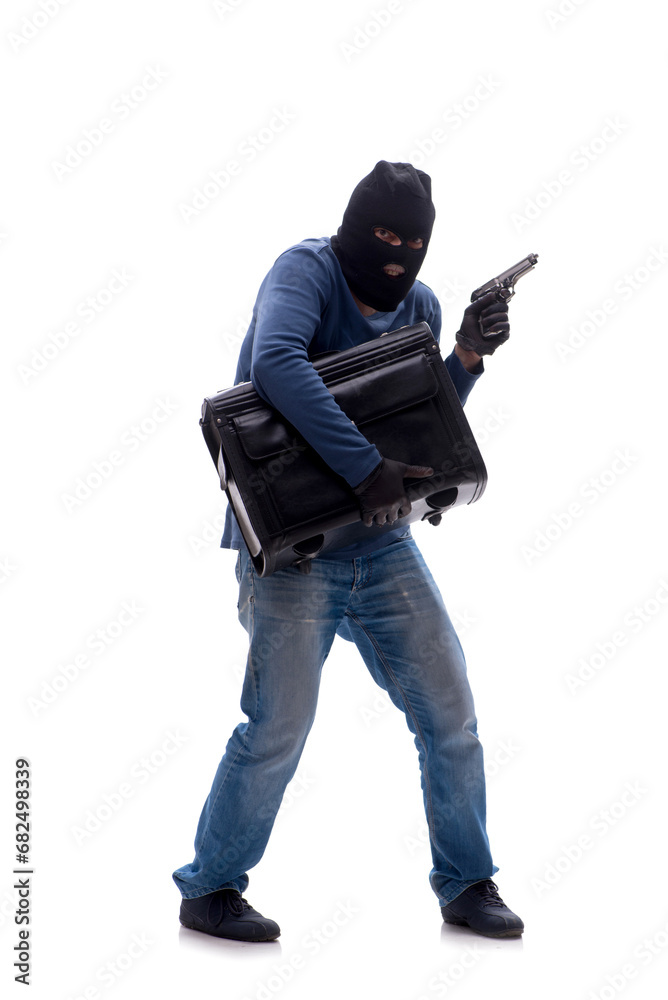 Young male burglar holding bag isolated on white Young male burglar holding bag isolated on white