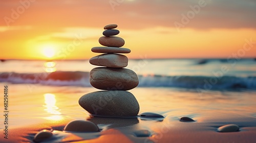 Vertical   mage  Stacking rocks on the beach  Balanced pebble pyramid silhouette at sunset. Zen stones on the beach  meditation  spa  harmony  calmness  balance concept.