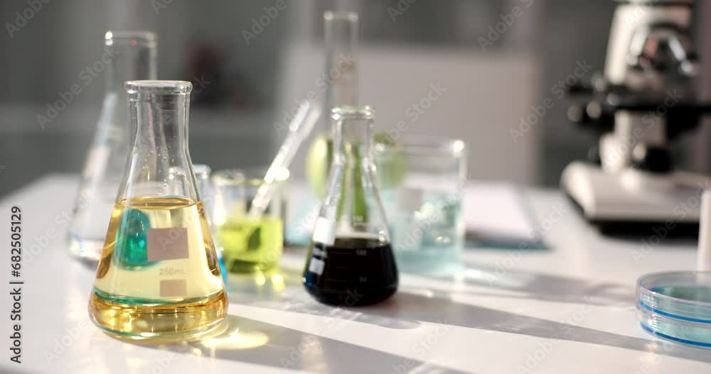 Study of yellow and black oil products in laboratory. Scientific research on hydrocarbons and oil quality testing Study of yellow and black oil products in laboratory. Scientific research on hydrocarbons and oil quality testing