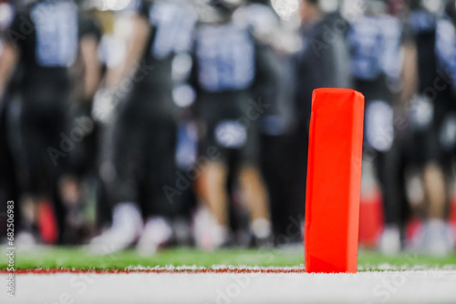 Closeup of a Pylon on the Endzone of a Turf Football Field