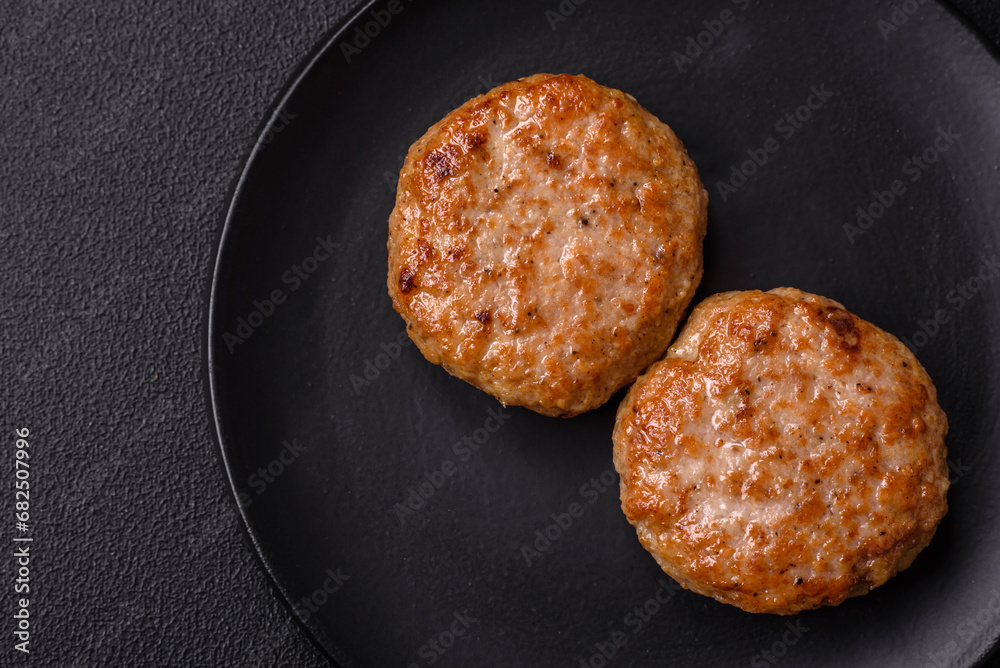 Delicious fresh fried minced fish cutlets with spices and herbs Delicious fresh fried minced fish cutlets with spices and herbs