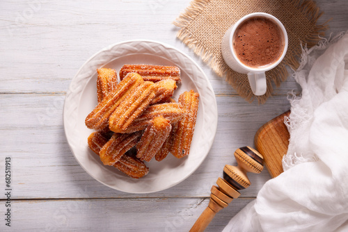 Churros. Fried wheat flour dough, a very popular sweet snack in Spain, Mexico and other countries where it is customary to eat them for breakfast or snack accompanied by hot chocolate or coffee.