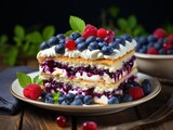 Homemade blueberry cake with whipped cream and fresh berries on wooden background