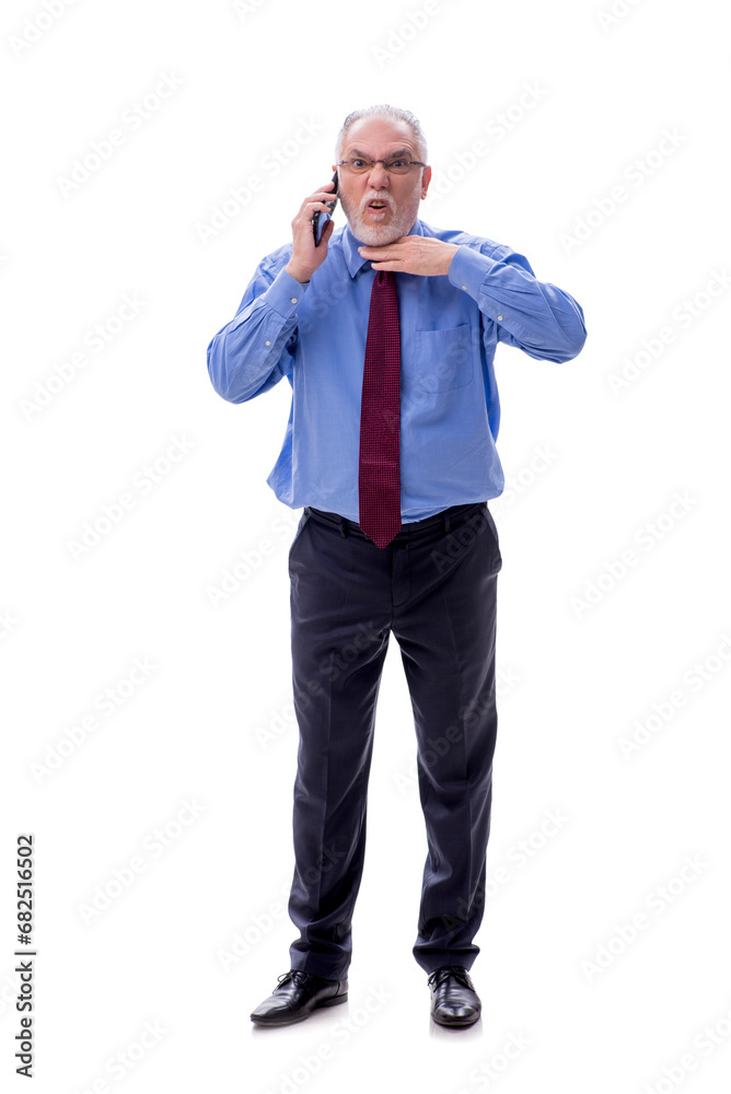 Old businessman talking by phone isolated on white Old businessman talking by phone isolated on white