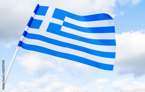 Flag of Greece against the blue sky. European state.