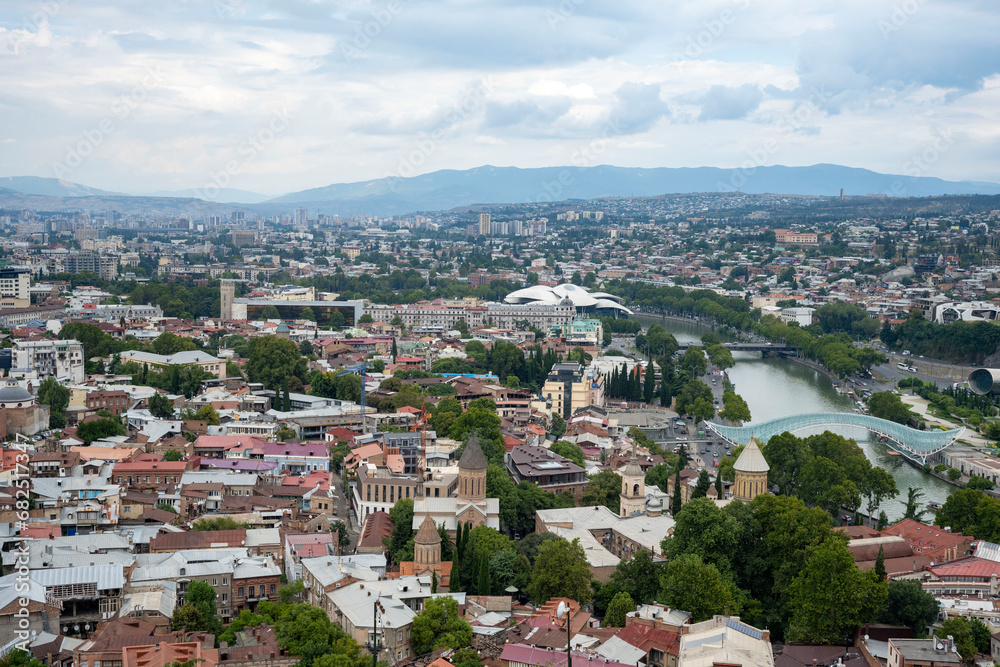 The Kura river, The Bridge of Peace, the cathedral, churches and the magnificent view of Tbilisi city from the cable car.
