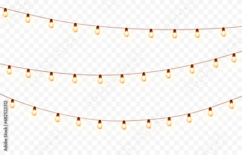 Lights bulbs isolated on transparent background. Glowing fairy Christmas garland strings. Vector New Year party led lamps decorations photo