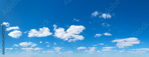 Panoramic fluffy cloud in the blue sky. Sky with cloud on a sunny day. © Pakhnyushchyy