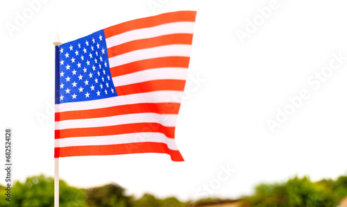 The American flag flutters in the sky. Close up of USA flag, stars and stripes, United States of America.banner for text. America.