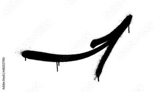 Graffiti arrow with overspray in black over white.