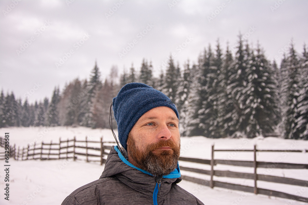 man with a beard in freezing cold in the winter freezes man with a beard in freezing cold in the winter freezes