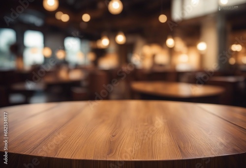 Empty wood table top of round on blur restaurant background product display montage